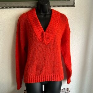 Fuzzy orange sweater